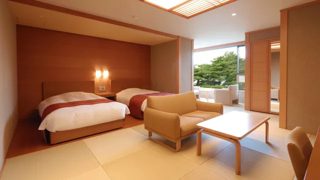غرفة بسريرين منفصلين بإطلالة على البحر في المبنى الرئيسي، Jodogahama Park Hotel 1/1