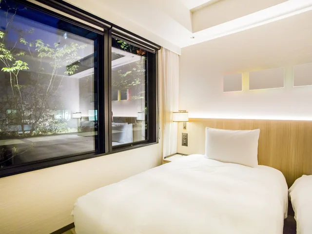 غرفة بسريرين منفصلين بإطلالة على الحديقة مع أريكة بحوض استحمام، Hyatt Place Kyoto 4/8