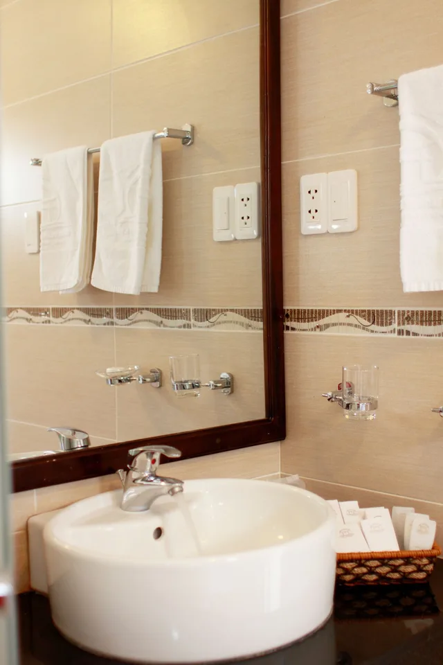 غرفة عائلية بسرير كوين وسريرين منفصلين بإطلالة على الحديقة، Le Aqua Resort & Spa Phan Thiet 7/7