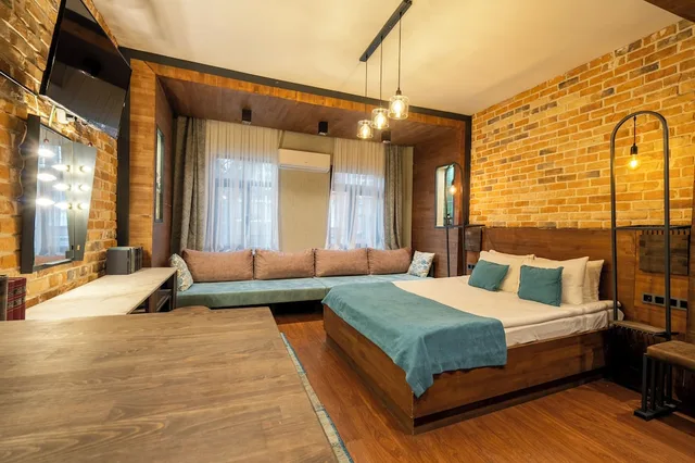 جناح تنفيذي بسرير كوين مع أريكة بحوض جاكوزي، Cube Suites 2/10