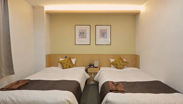جناح أساسي بسريرين منفصلين، Hotel Annex Inn 1/2