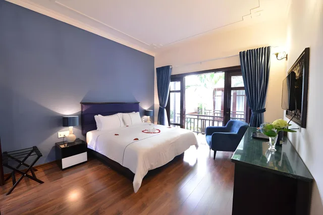غرفة ديلوكس بسرير مزدوج بإطلالة على الحديقة، TTC Hotel Hoi An 3/4