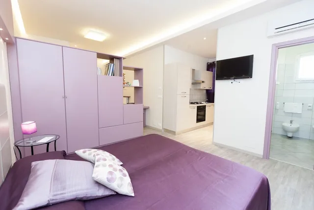 استوديو بثلاثة أسرّة في الملحق، Albergo Centrale Bologna 4/7