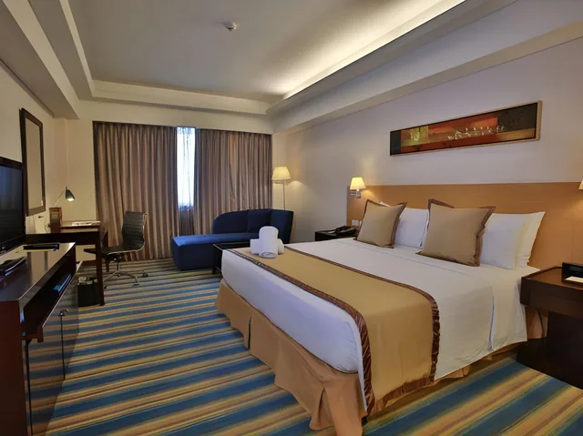 غرفة ديلوكس بسرير كينج للمدخنين، Luxent Hotel 1/1