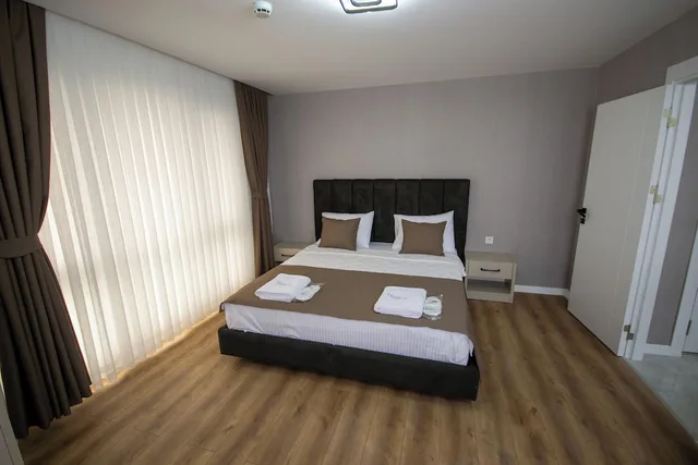 جناح عائلي ديلوكس بسريرين منفصلين مع أريكة، Luxury Life Suites 1/9