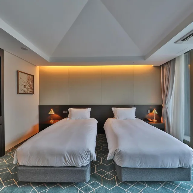 غرفة عائلية بسريرين منفصلين، Camphortree Hotel And Resort 3/5
