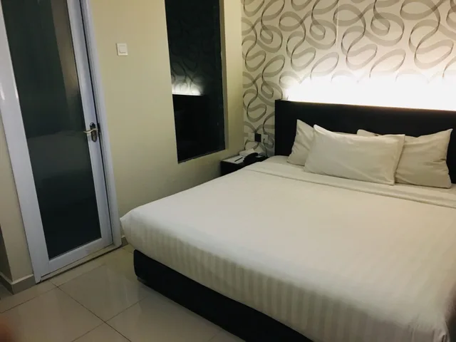 غرفة ديلوكس بسرير كوين، IZUMI HOTEL BUKIT BINTANG 1/3