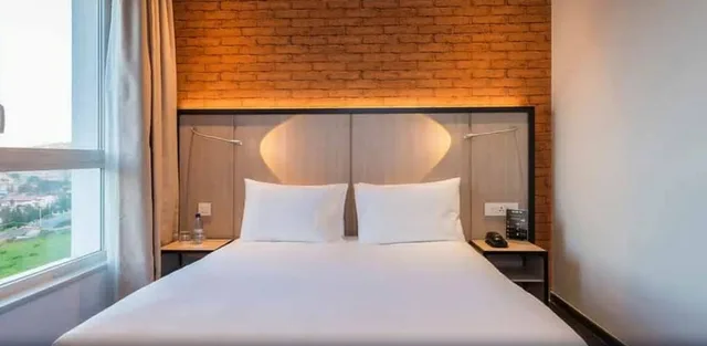 غرفة قياسية بسرير كوين، Onomo Hotel Kigali 3/4