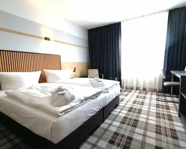 غرفة قياسية بإطلالة على الفناء مفردة بسرير كوين، MEDIAN HOTEL HANNOVER LEHRTE 2/9
