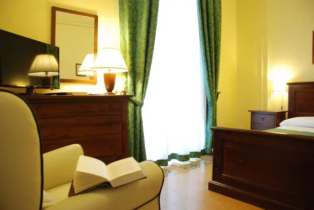 غرفة ثلاثية، Del Centro Hotel 1/4