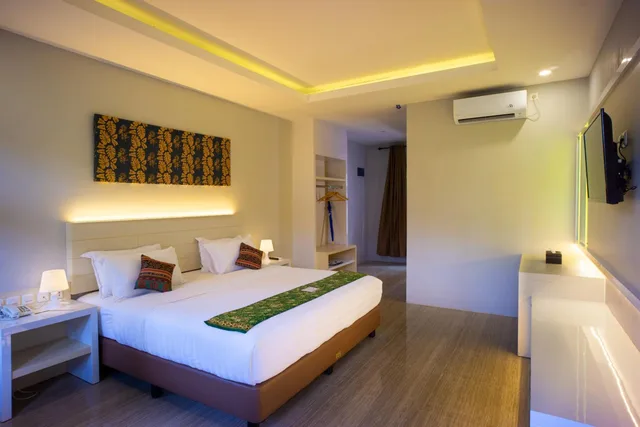 غرفة ديلوكس بسرير كينج بإطلالة على الحديقة، Grand Harvest Resort and Villas 6/10