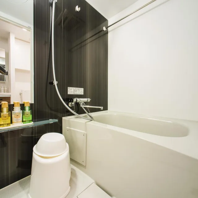 غرفة بسريرين منفصلين وسرير بطابقين، Hotel Axas Nihonbashi 6/10