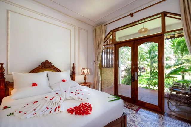 غرفة ديلوكس بسرير كينج بإطلالة جزئية على البحر، Coco Palm Beach Resort Spa 1/4
