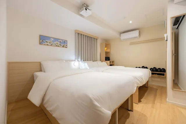 غرفة قياسية ثلاثية بسرير مزدوج وسرير فردي، Myeongdong Guesthouse Como 2/9