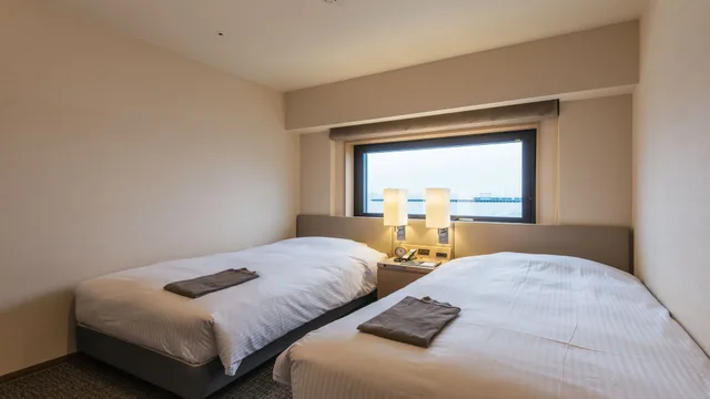 غرفة اقتصادية بسريرين منفصلين، JR Inn Asahikawa 1/5