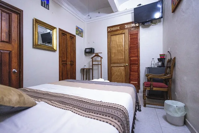 غرفة سوبيريور بسرير مزدوج، Capital O Hotel Patio Pombo 1/3