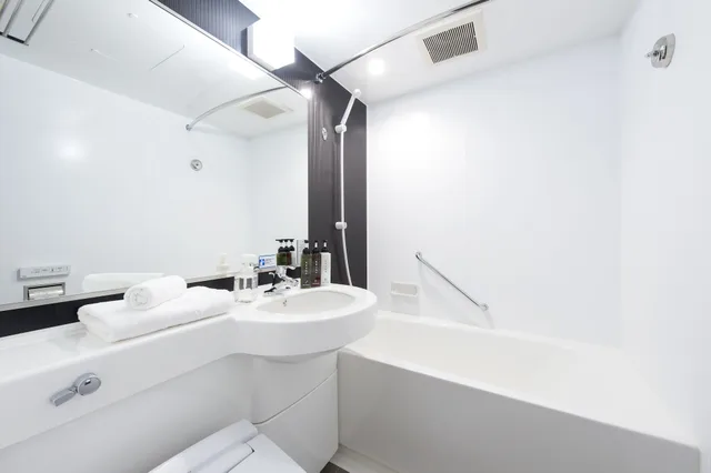 غرفة بسريرين منفصلين مع سرير إضافي، Hotel Villa Fontaine Tokyo Kayabacho 3/3