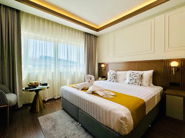 غرفة ديلوكس مفردة بسرير مزدوج، Fortune Plaza Hotel 1/1