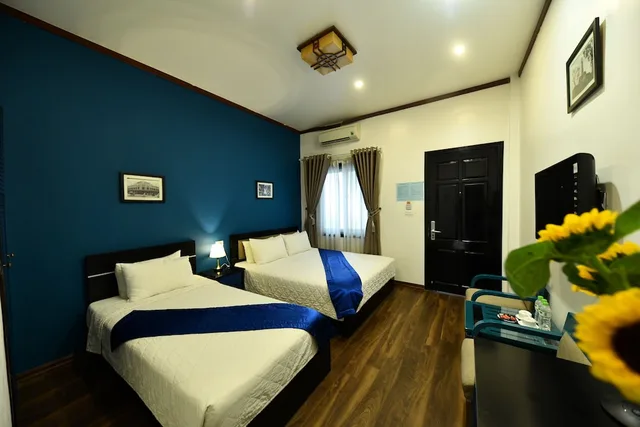 غرفة ديلوكس ثلاثية بسرير مزدوج وسرير فردي، Hanoi Starlight Hotel 1/5