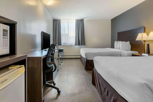 Suite, 2 Queen Beds, Super 8 by Wyndham Macleod Trail Calgary 2/3