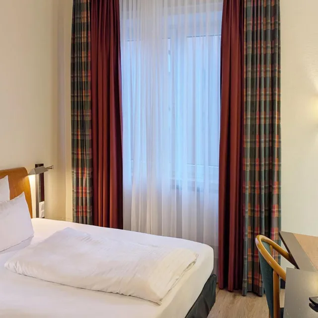 غرفة قياسية بسرير كينج وسرير كوين، Select Hotel Tiefenthal 3/7