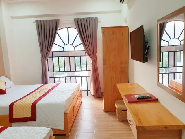 غرفة ديلوكس بسرير كوين وسرير فردي، Quy Nhon Center Hotel 5/6