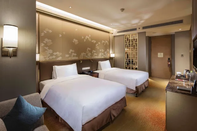 غرفة تنفيذية ركنية بسريرين مزدوجين، Hilton Yantai 3/5