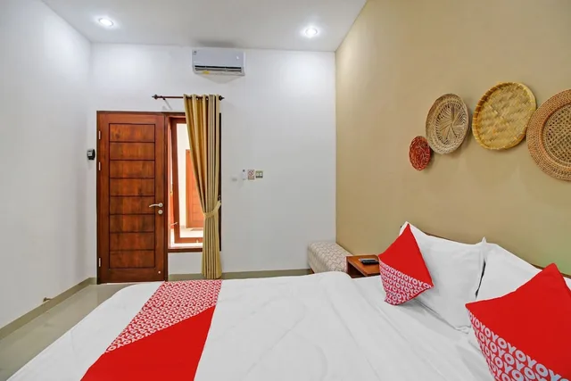 غرفة ديلوكس مزدوجة، OYO 90820 Madania Guesthouse Syariah 1/10