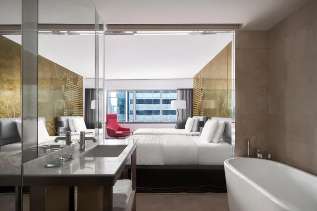 غرفة بسريرين مزدوجين مع دخول صالة النادي، Le Meridien Saigon 4/4