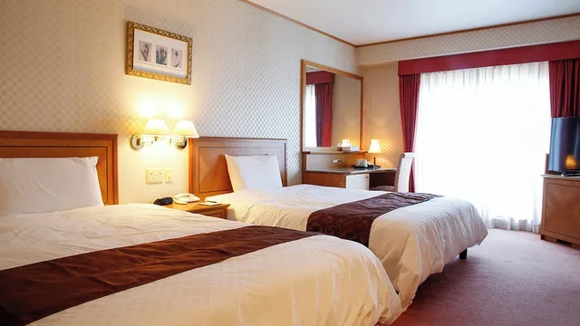 جناح جونيور بسريرين كوين مع سرير إضافي مع أريكة بحوض جاكوزي، Hotel Bellmare 1/2