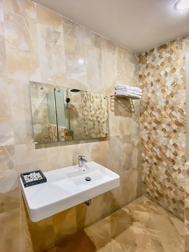 غرفة عائلية بسرير كينج وسرير فردي، Hotel Alia Boutique Pasar Baru 3/3