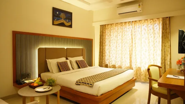 غرفة ديلوكس بسرير كوين، Hotel Ganpati Palace 1/1