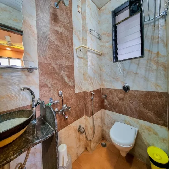 جناح تنفيذي بسريرين منفصلين بمنطقة جلوس، Lillywoods Highland Beach Resort 7/8