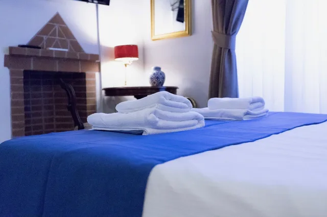 غرفة ديلوكس بسرير كوين مع أريكة، Navona Residenza De Charme 1/10
