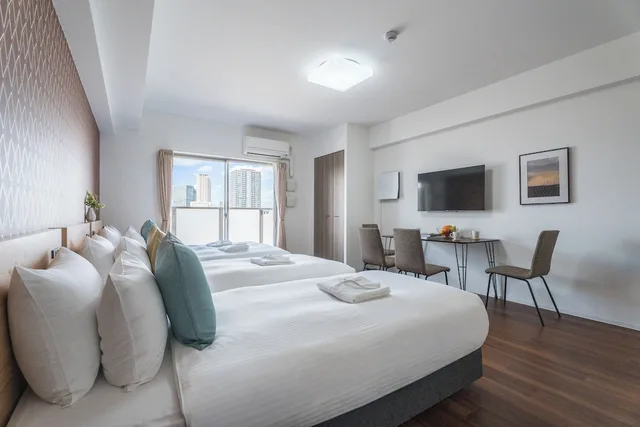 غرفة عائلية ثلاثية بسرير مزدوج وسريرين منفصلين، Eslead Hotel Namba Ebisu West 1/10