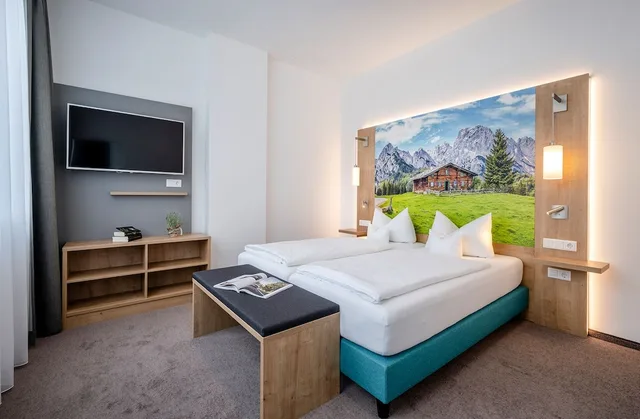 غرفة عائلية بسرير كوين وسريرين فرديين، Avalon Bad Reichenhall 1/5