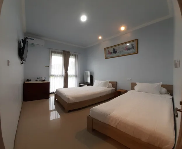 غرفة ديلوكس بسريرين منفصلين، Pesona Osing Hotel Butik 1/2