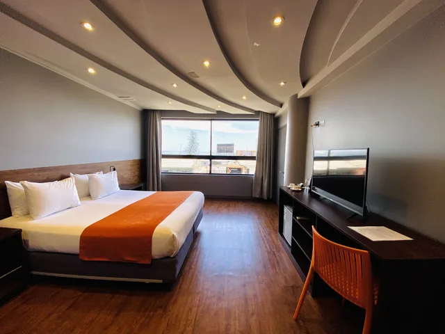 غرفة تنفيذية بسريرين منفصلين بغرفة نوم واحدة، Hotel Spark Suites Iquique 1/4