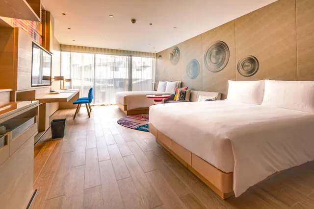 غرفة بسريرين كوين بإطلالة على المدينة، HOTEL INDIGO KAOHSIUNG CENTRAL PARK 1/1