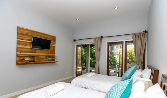 غرفة بسريرين منفصلين بإطلالة على الحديقة، Bale Sampan Bungalows 6/10