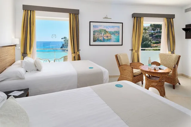 جناح كومفورت بسريرين مزدوجين بإطلالة على البحر بشرفة بغرفة نوم واحدة، Hotel Apartamentos Cala Santanyi 6/9