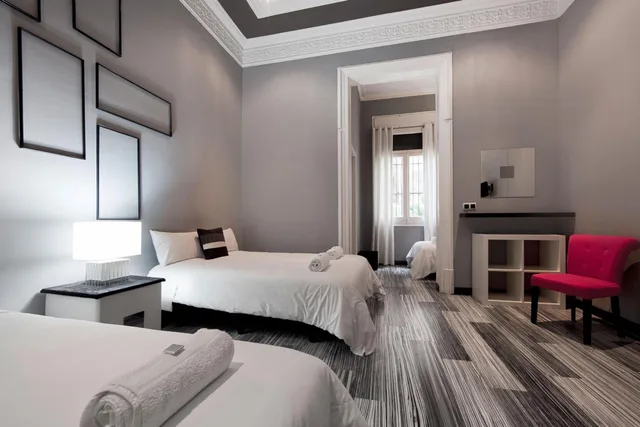 غرفة رباعية بسرير فردي وسريرين مزدوجين، Hostal Boutique Khronos 1/1