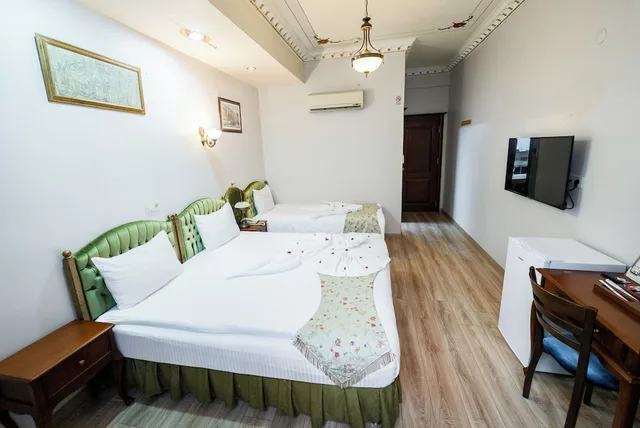 غرفة اقتصادية ثلاثية بسرير مزدوج وسرير فردي، Basileus Hotel 5/8