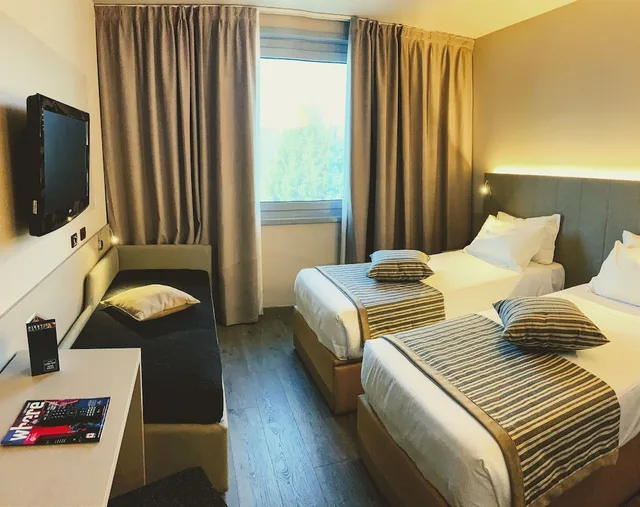 Deluxe, Triple, 1 Queen and 1 Single Bed, First Hotel Malpensa 1/7