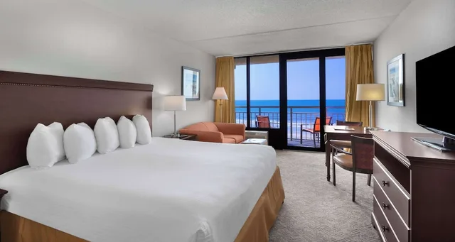 Suite, King Bed, Ocean Front, Sofa, Balcony, Best Western Ocean Sands Beach Resort 2/10