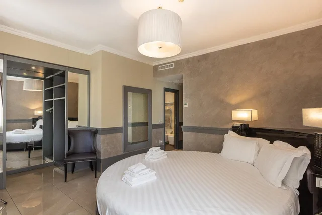 غرفة ديلوكس بسرير كينج، Hotel Castellino Roma 2/9