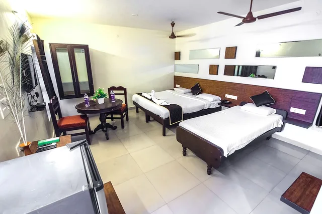 غرفة كلاسيكية بسرير كينج وسرير فردي، OYO Rooms off Aurobindo Ashram 1/1