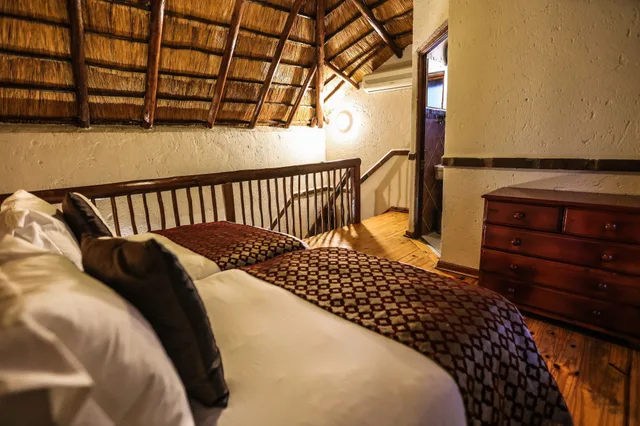 شاليه عائلي بسريرين منفصلين بإطلالة على الحديقة بغرفتي نوم، Grand Kruger Lodge And Spa 5/6