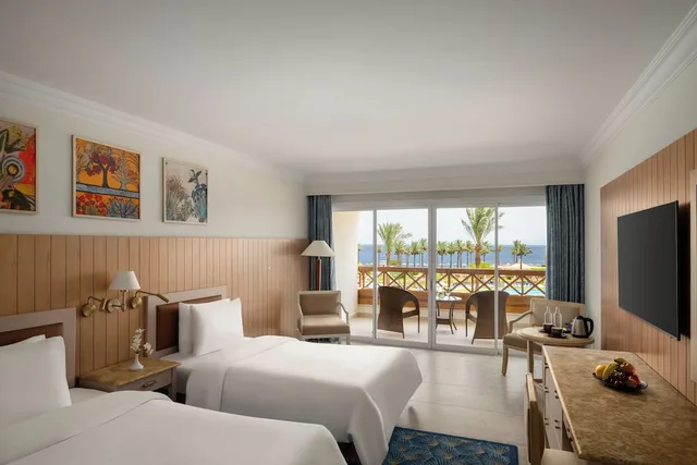 غرفة كلاسيكية بسريرين منفصلين بإطلالة على المسبح، Movenpick Taba 7/10