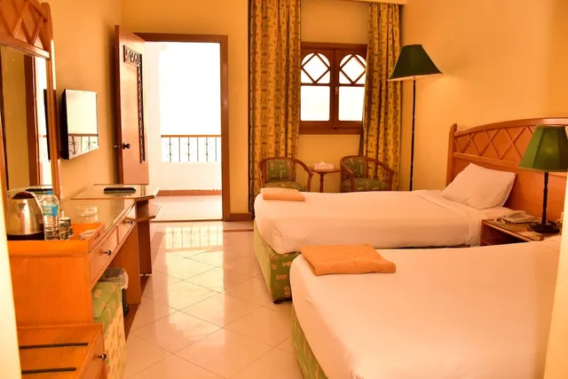 غرفة قياسية بسريرين منفصلين، Dive Inn Resort 1/3